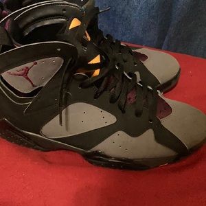 Size 8.5 Jordan’s black and purple